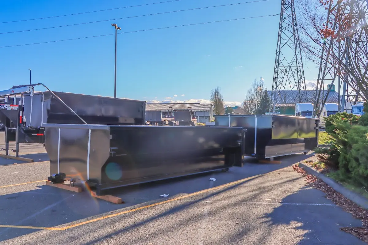 Roll-off dumpster ready for waste disposal at job site for 15 Yard Dumpster Rental in Kettering